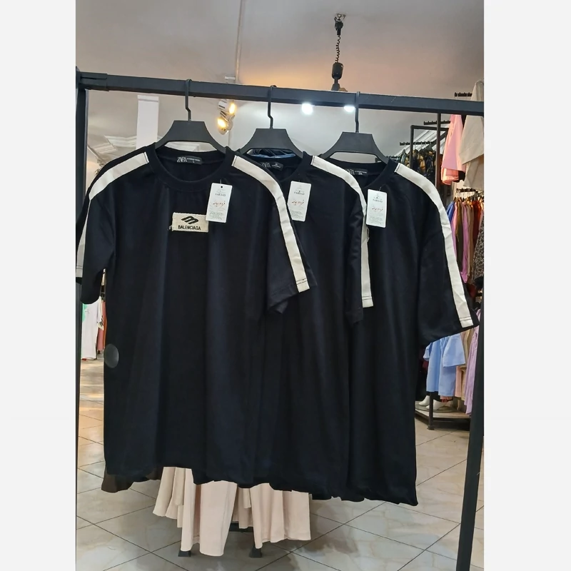 تیشرت مشکی مردانه با نوار کنفی طرح BALENCIAGA کد 501495/1