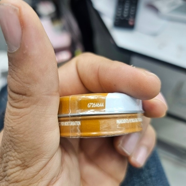 بالم لب وازلین فلزی اورجینال لهستانی مدل Cocoa Butter (حجم 20 گرم) ترمیم کننده و درمانی خشکی لب رایحه کاکائو