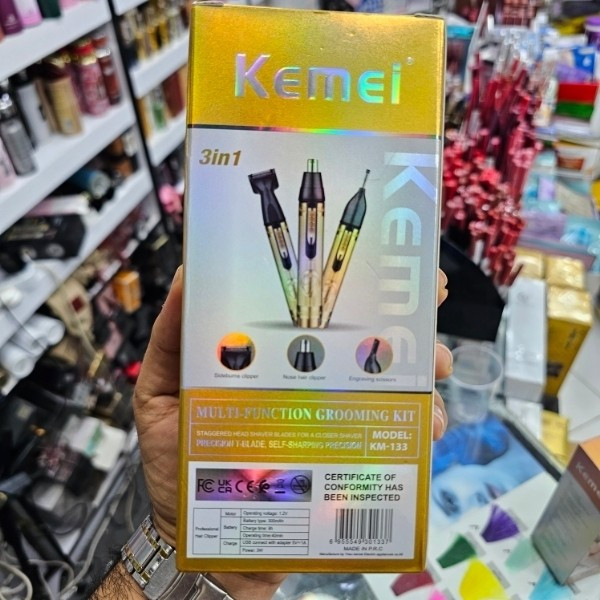 ست اصلاح صورت کیمی مدل KM-133 بدنه فلزی دارای سه سری شامل موزن بینی و گوش، سری خط زن و سری اصلاح ابرو